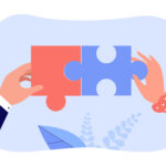 Zwei Hände verbinden Puzzle‑Teile als Symbol für Zusammenarbeit
